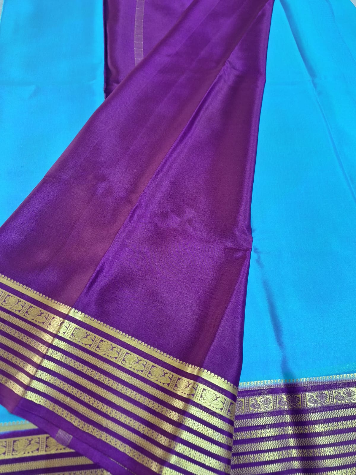 Pure Mysore Crepe Silk - Capri Blue with Purple Peacock Motifs Border