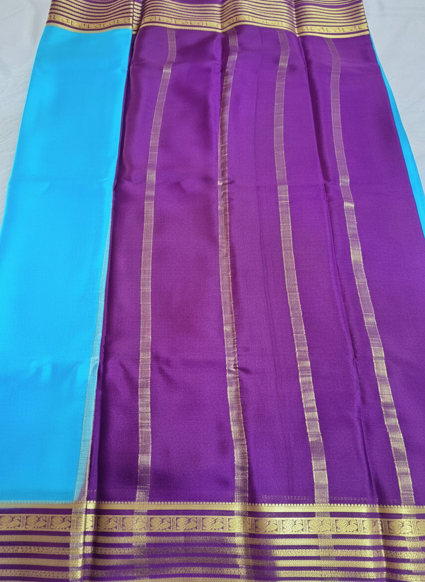Pure Mysore Crepe Silk - Capri Blue with Purple Peacock Motifs Border